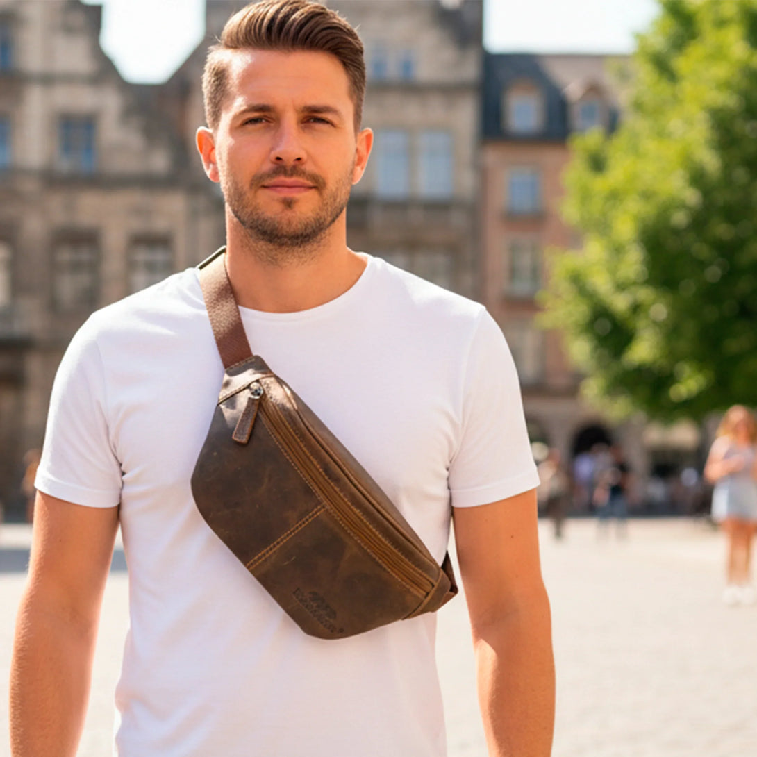 Personalized leather wallet and belt gift set for men displayed on man in white shirt outdoors